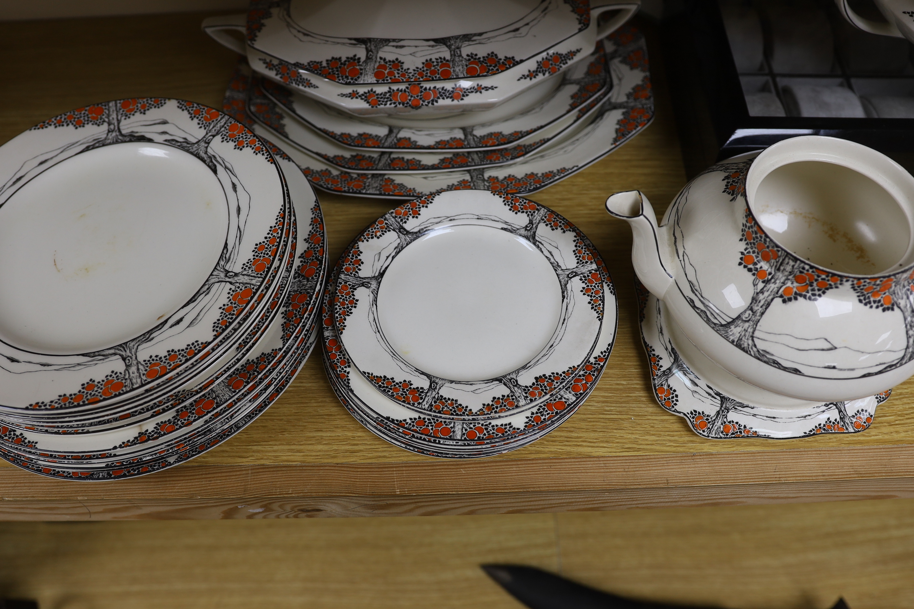 A Crown Ducal orange tree pattern part dinner set including tureens, side plates and jug, together with a Royal Doulton plate, largest 32cm wide